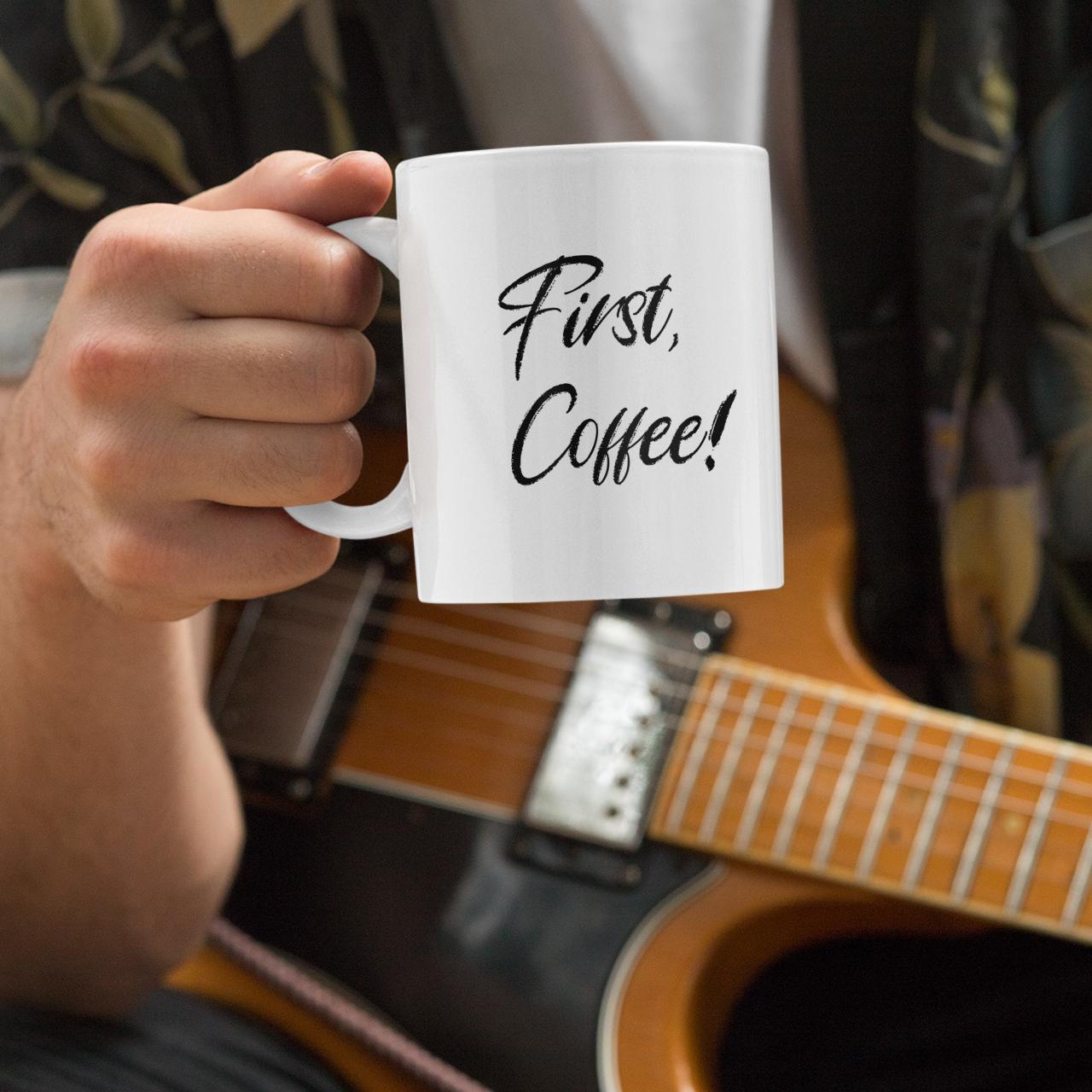 closeup-guitarist-holding-coffee-mug