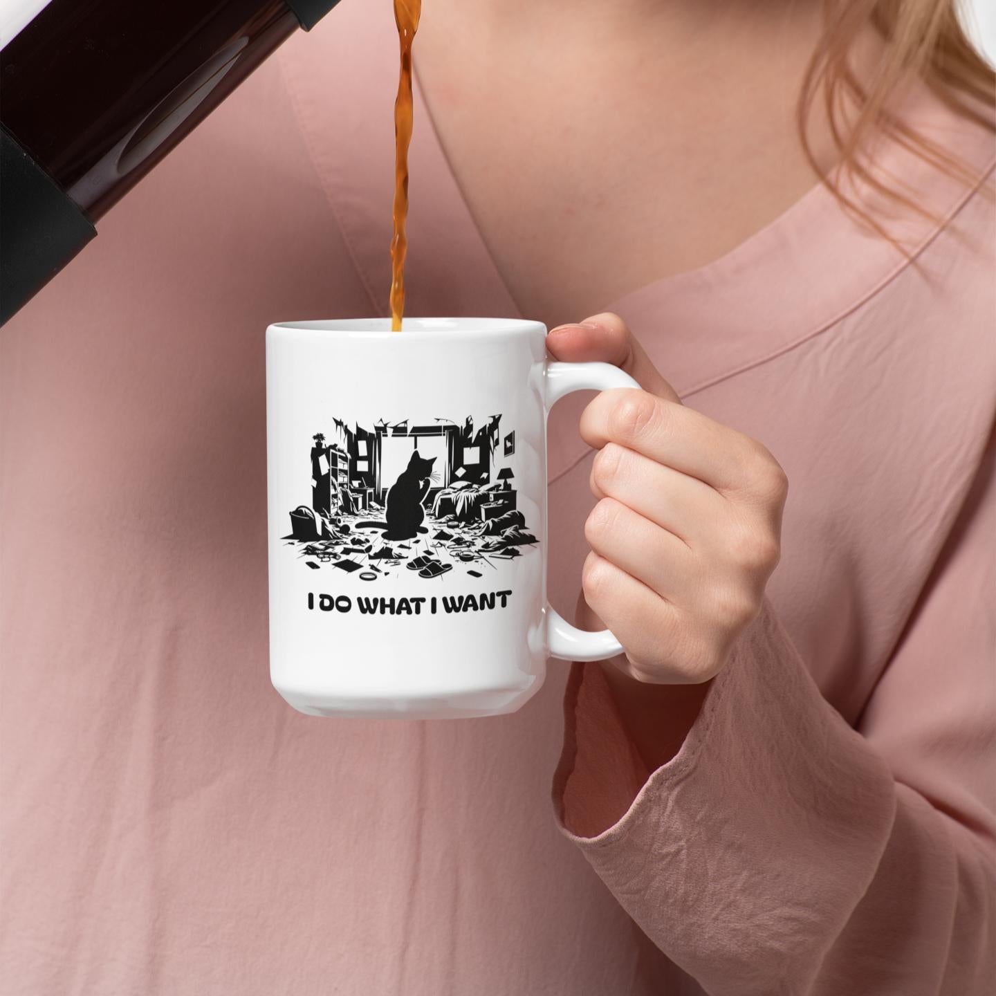young-woman-holding-mischievous-cat-mug