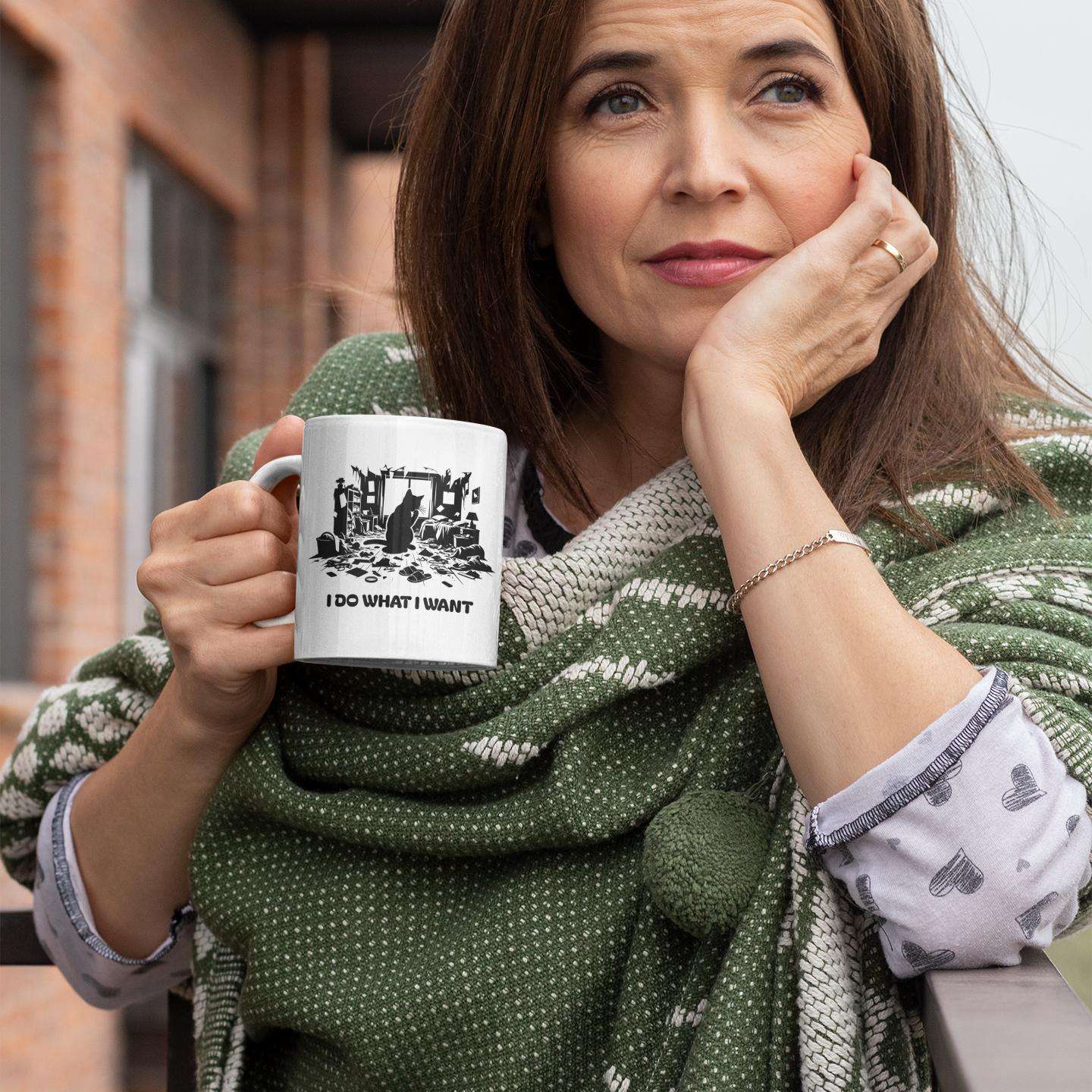 pensative-woman-holding-funny-chaotic-cat-mug