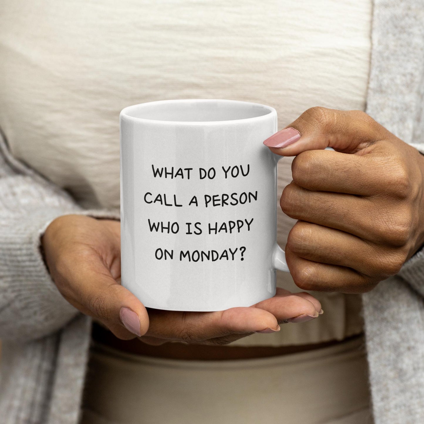 closeup-hands-holding-happy-monday-quote-mug