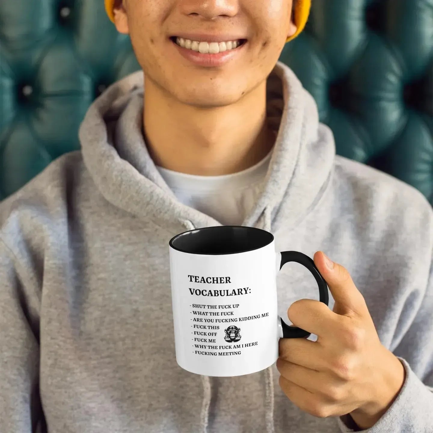 young-man-holding-rude-teacher-vocabulary-mug