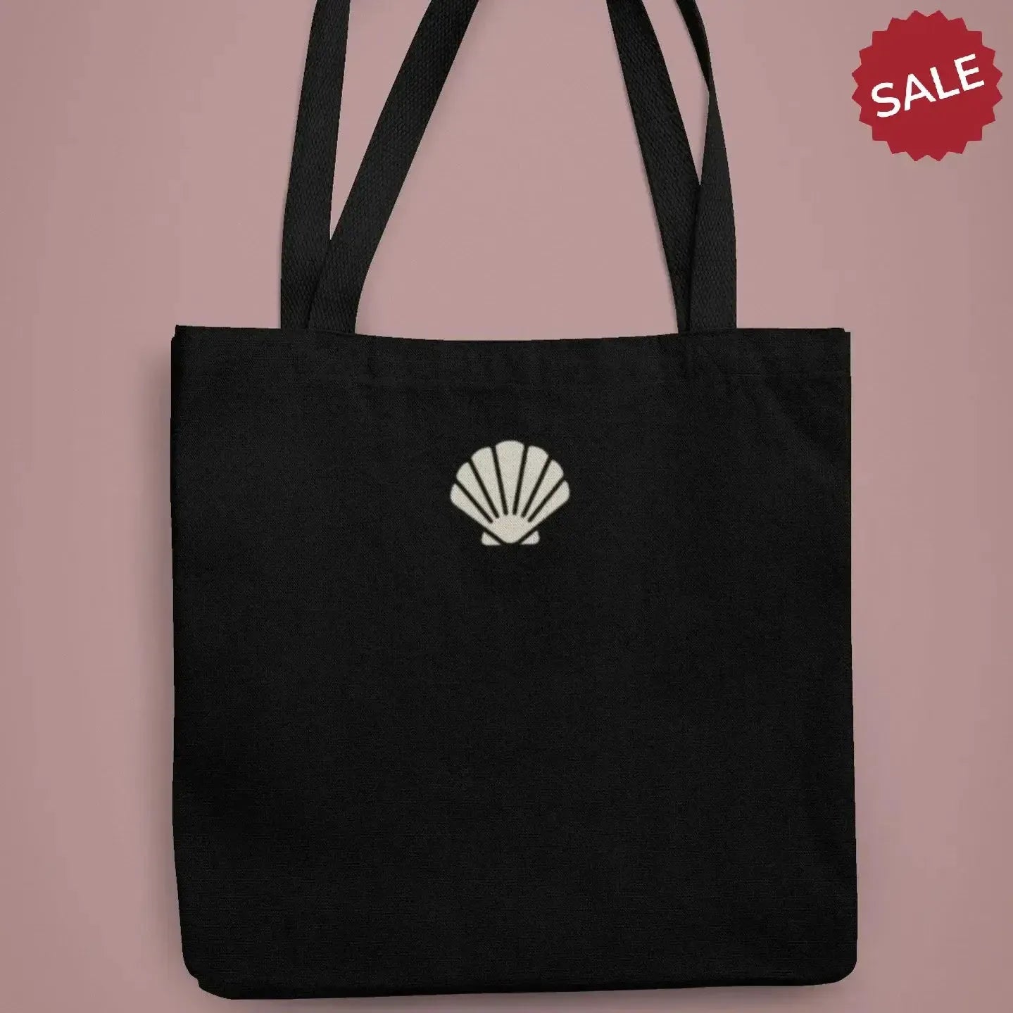 coastal-inspired-shell-print-on-black-fabric
