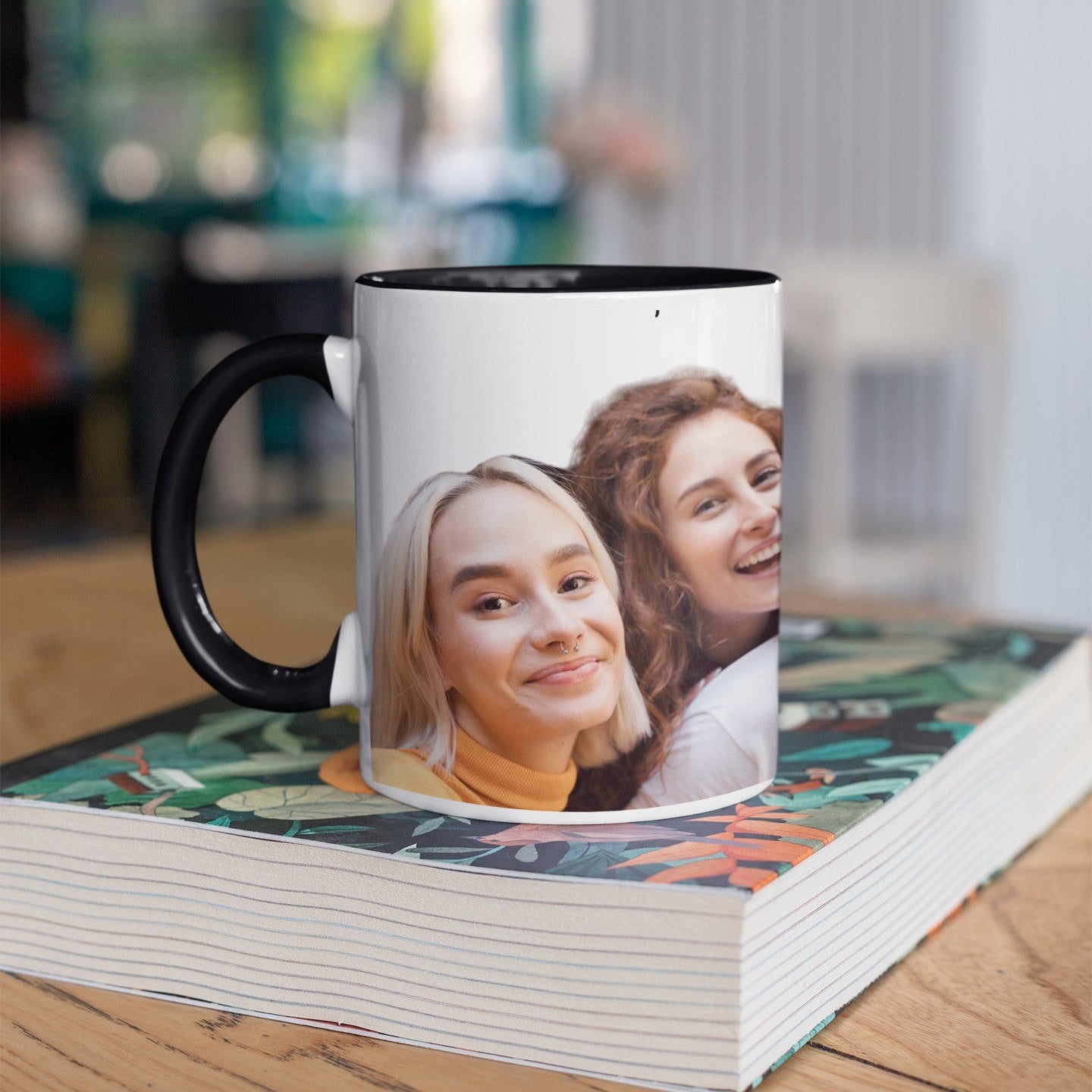 custom-photo-black-two-toned-mug-on-book