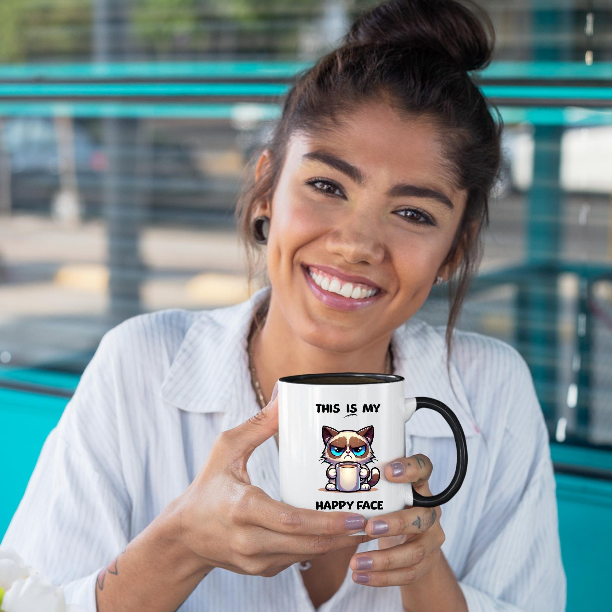 young-woman-holding-cute-cartoon-cat-mug