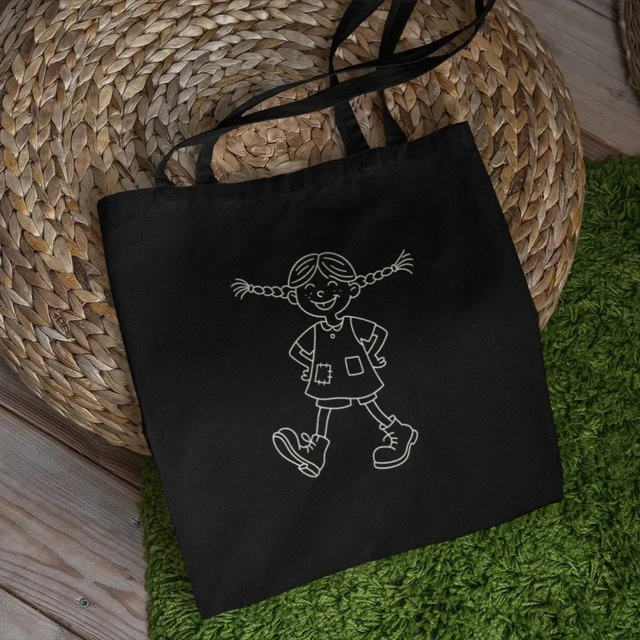playful-girl-line-art-tote-bag-on-black-background