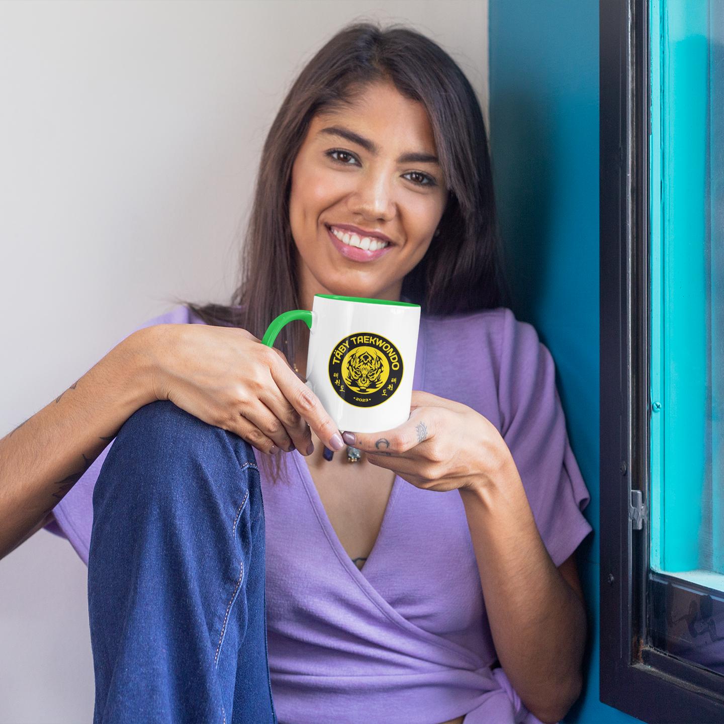 smiling-woman-holding-taekwondo-coffee-mug