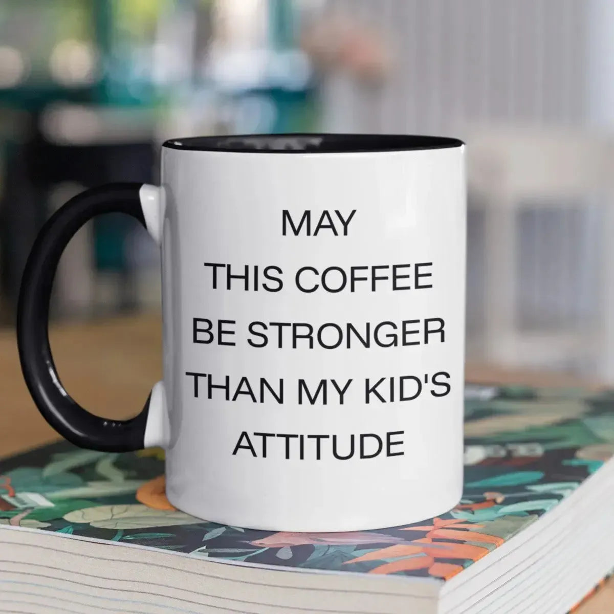 sarcastic-parenting-text-mug-on-book