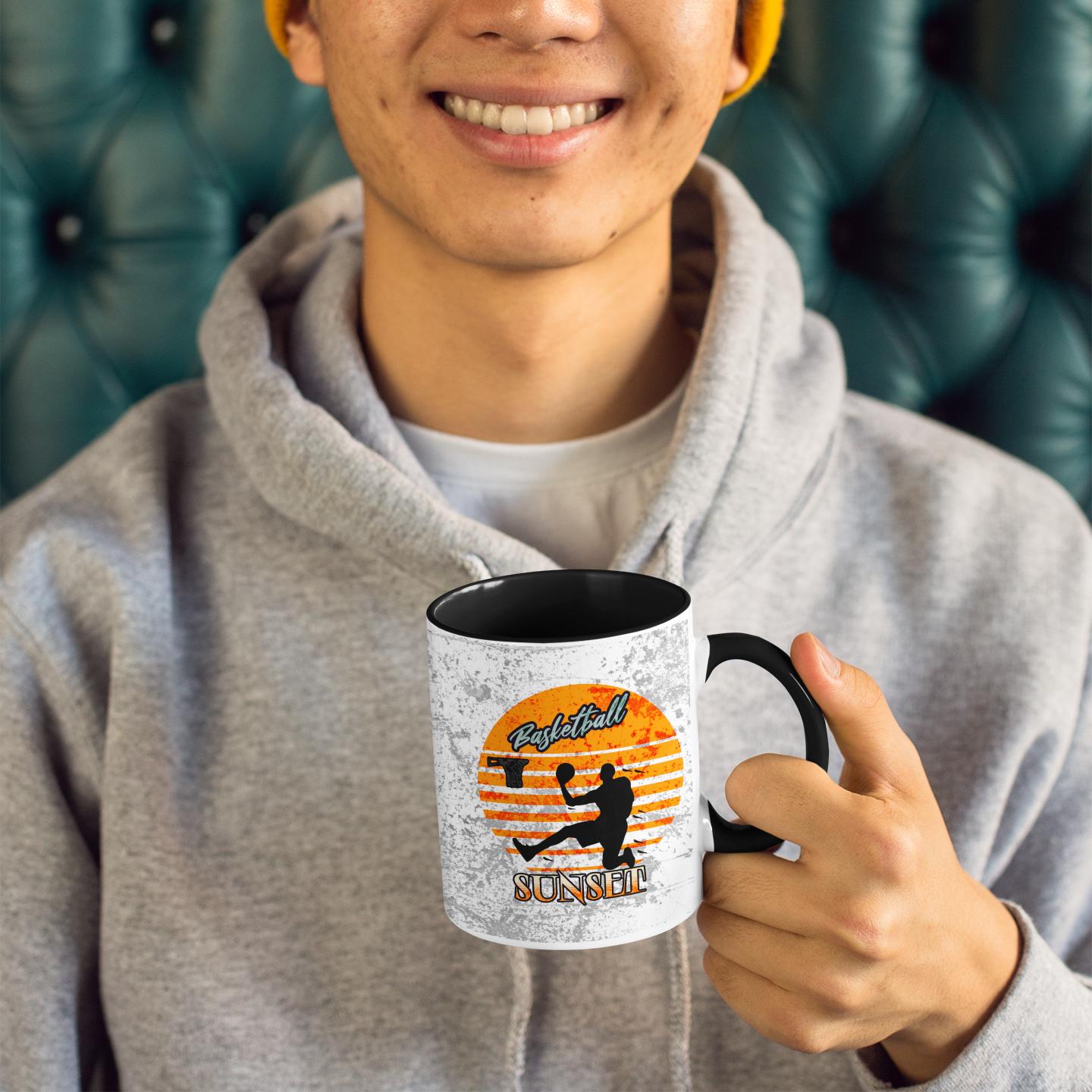 smiling-young-man-holding-basketball-mug